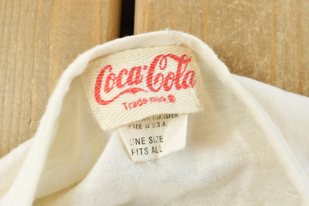Vintage 1980s Coca Cola Graphic Henley Long Sleeve T Shirt Men's L from propervintagecanada