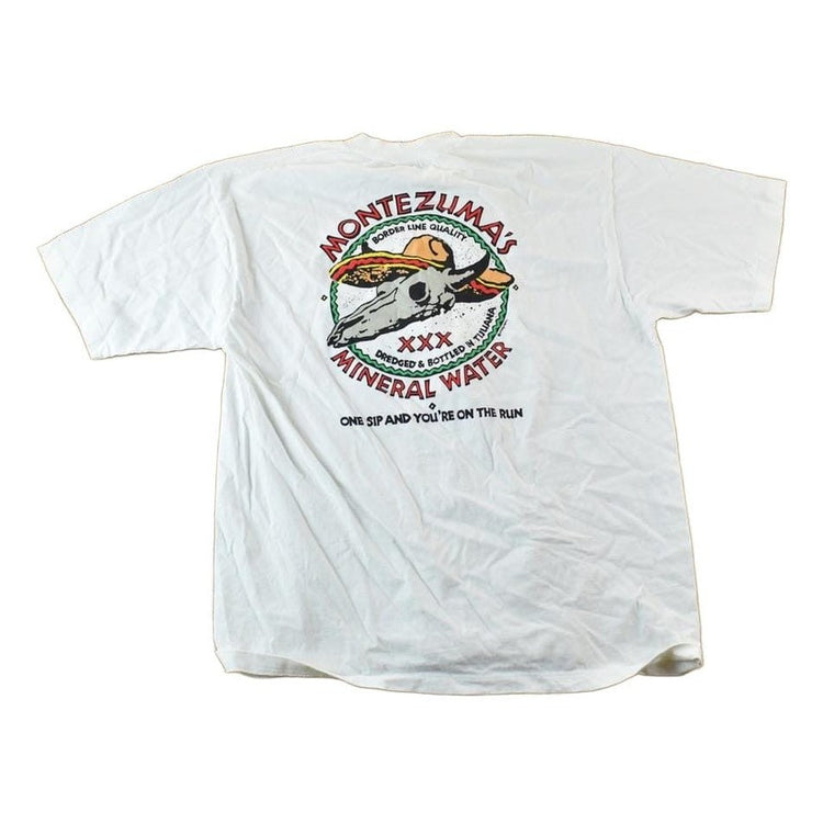 Vintage 1980s Crazy Shirts Montezumas Mineral Water Souvenir Single Stitch Graphic Print T-Shirt Men's Large from propervintagecanada