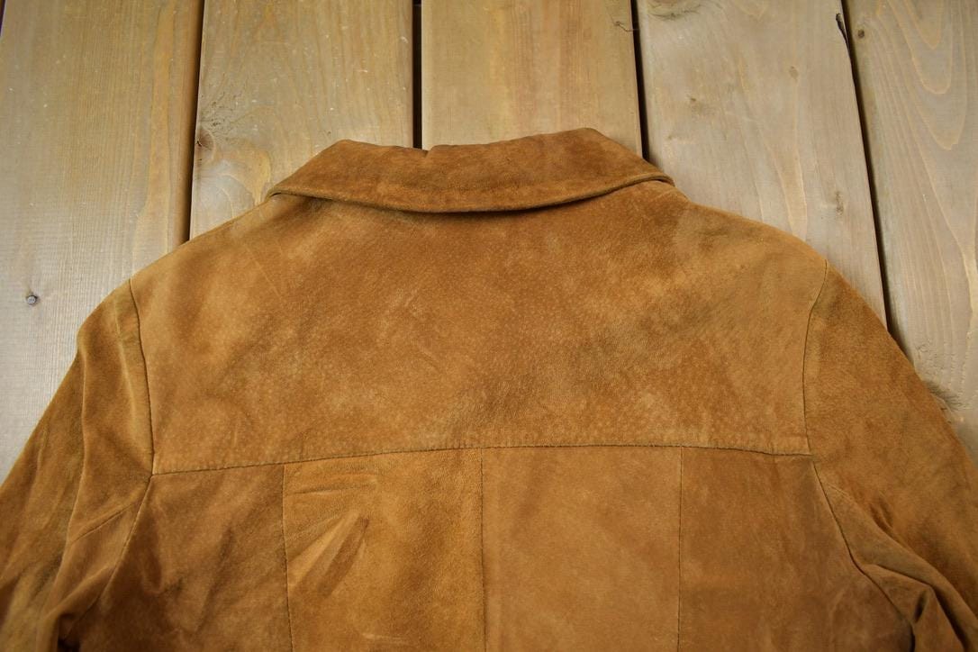 Vintage 1980s Dantelli Clasp Closure Suede Leather Coat Women's Small from propervintagecanada