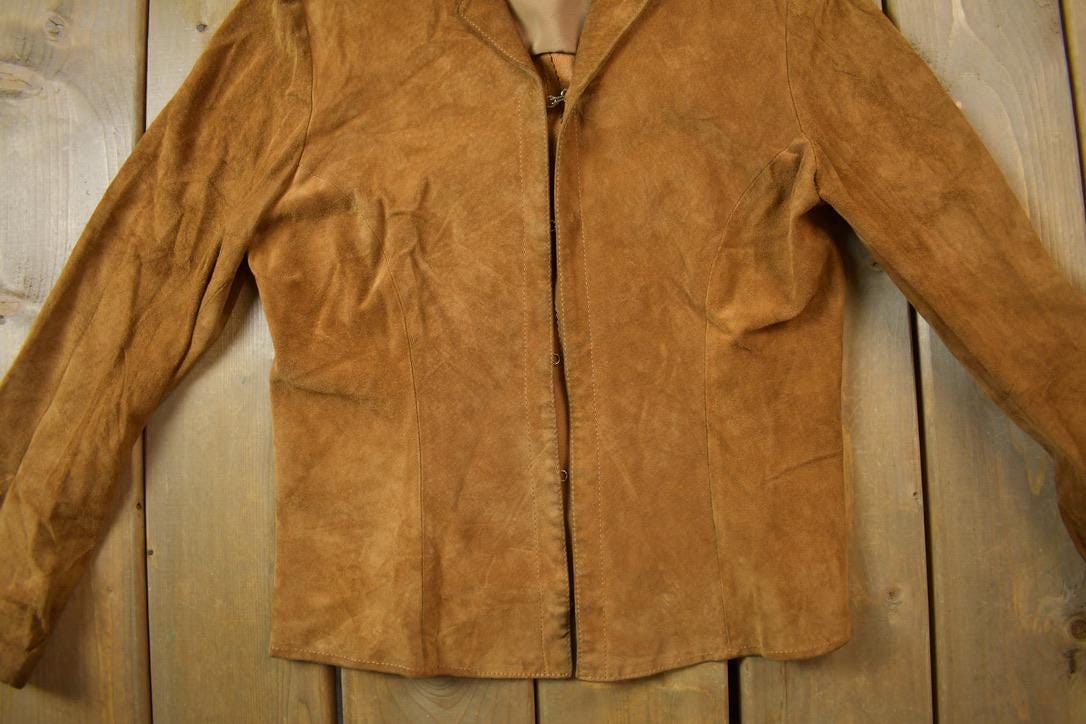 Vintage 1980s Dantelli Clasp Closure Suede Leather Coat Women's Small from propervintagecanada
