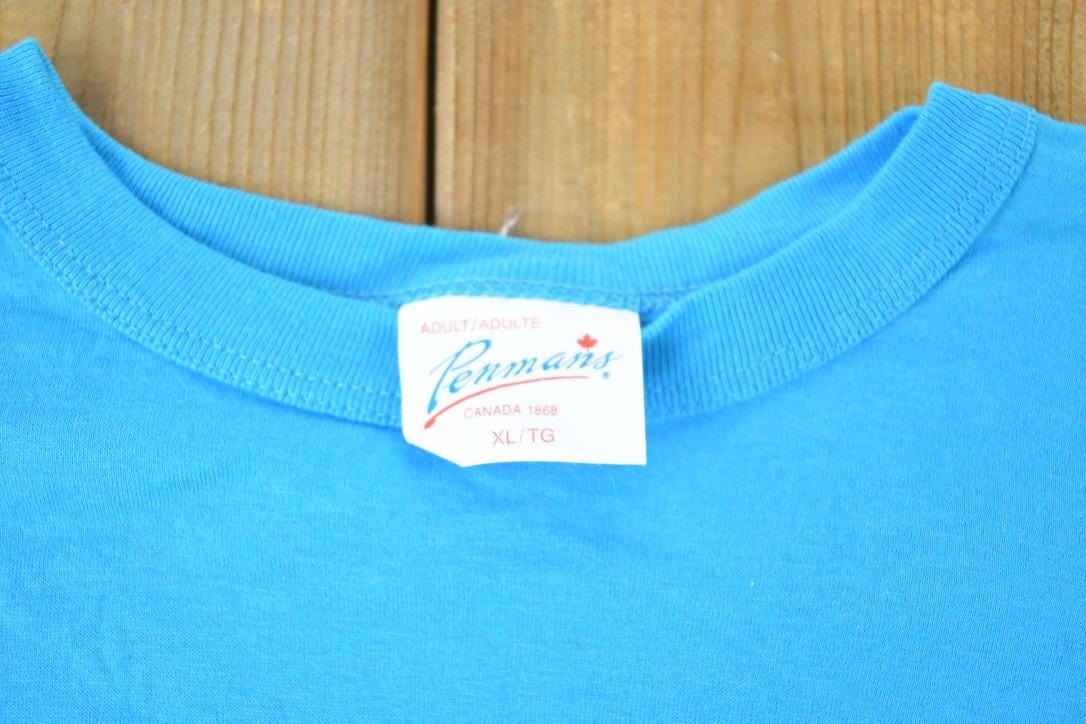 Vintage 1980s Deadstock Penmans Babcock and Wilcox Soccer Souvenir Single Stitch Graphic Print T-Shirt Made In USA Men's XL