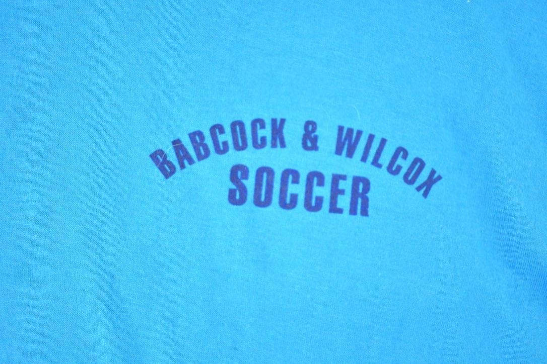 Vintage 1980s Deadstock Penmans Babcock and Wilcox Soccer Souvenir Single Stitch Graphic Print T-Shirt Made In USA Men's XL