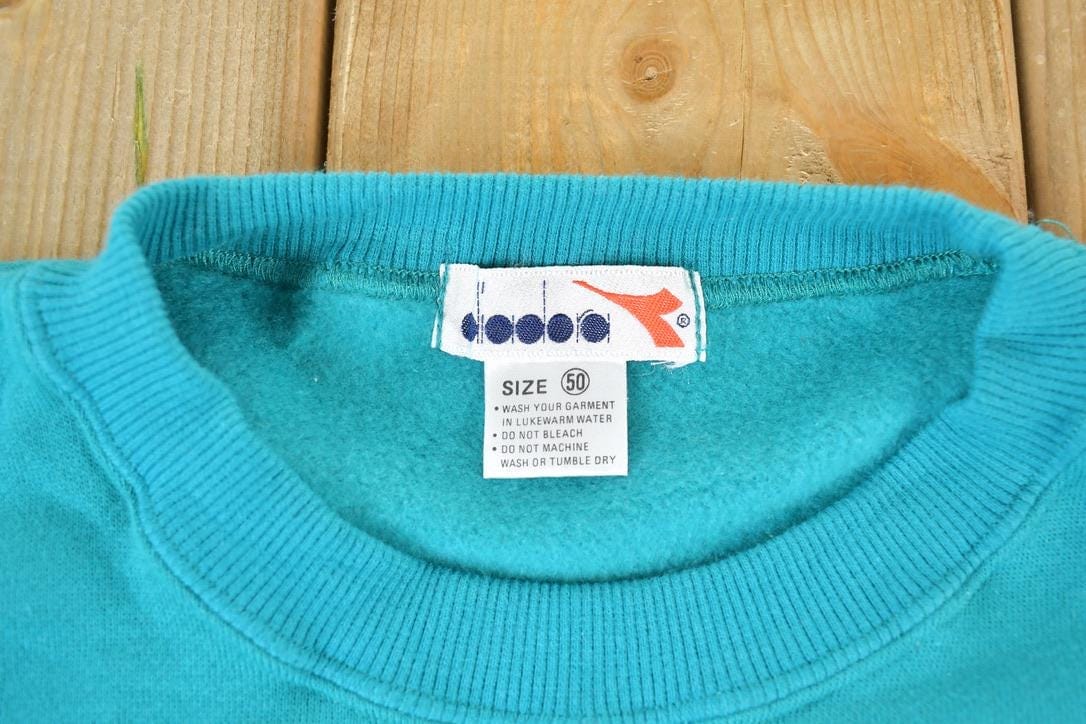 Vintage 1980s Diadora Soccer Souvenir Crewneck Sweatshirt Made In USA Men's Medium from propervintagecanada
