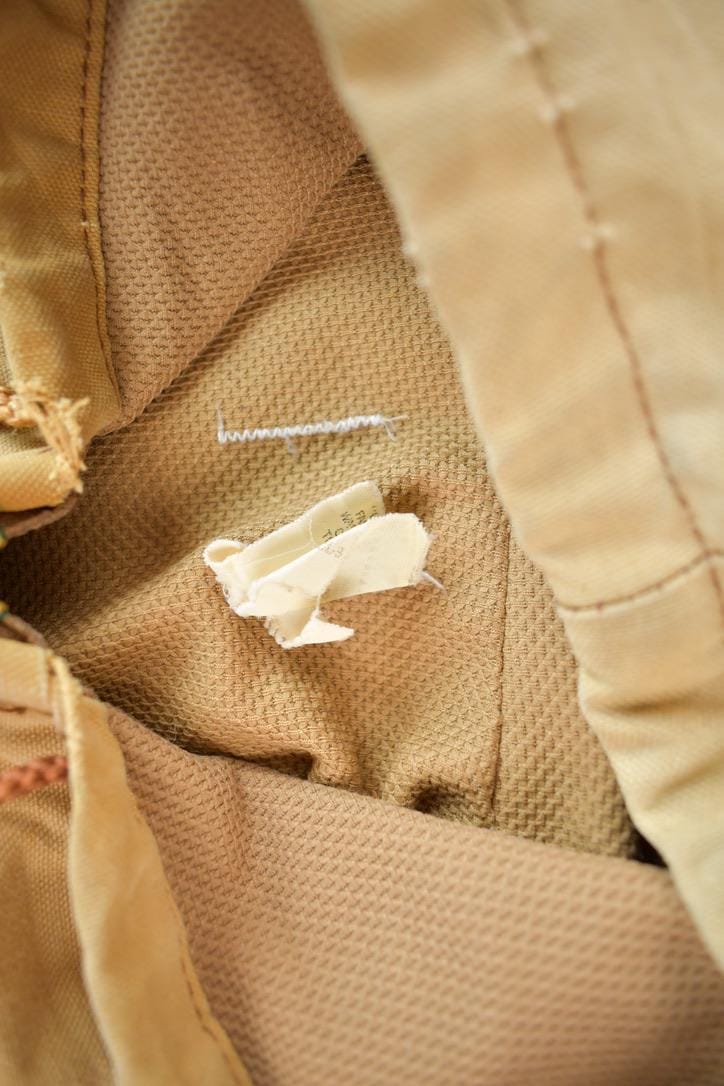 Vintage 1980s Distressed Carhartt Beige Work Jacket Men's XL from propervintagecanada