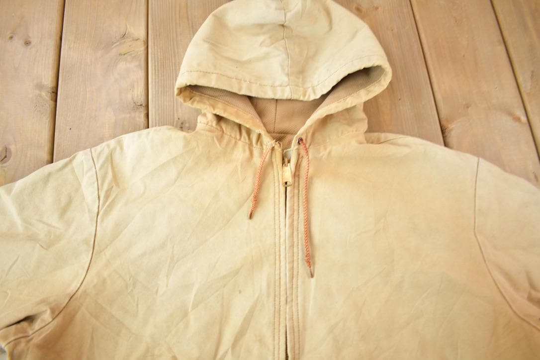 Vintage 1980s Distressed Carhartt Beige Work Jacket Men's XL from propervintagecanada