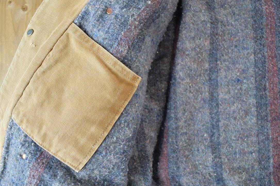 Vintage 1980s Distressed Carhartt Blanket Lined Chore Coat Men's M from propervintagecanada