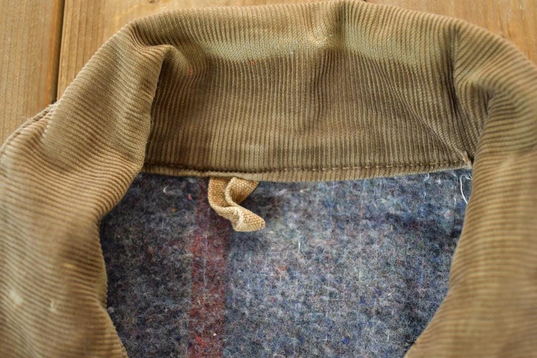 Vintage 1980s Distressed Carhartt Blanket Lined Chore Coat Men's M from propervintagecanada