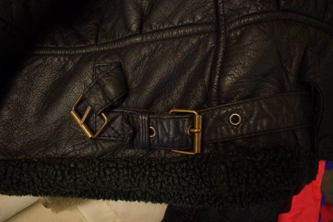 Vintage 1980s Dona Black Leather Hooded Flight Jacket Men's Large from propervintagecanada