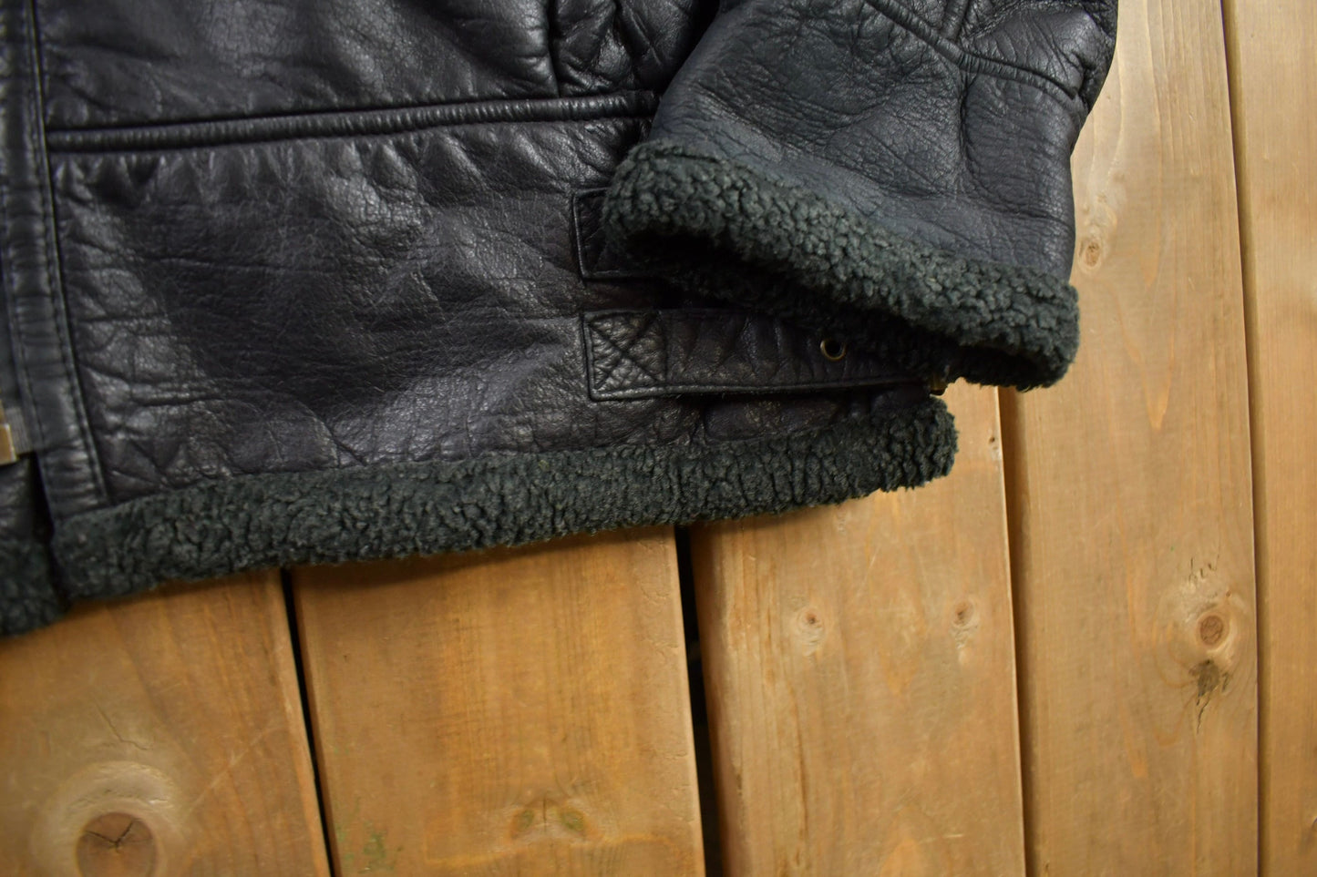 Vintage 1980s Dona Black Leather Hooded Flight Jacket Men's Large from propervintagecanada