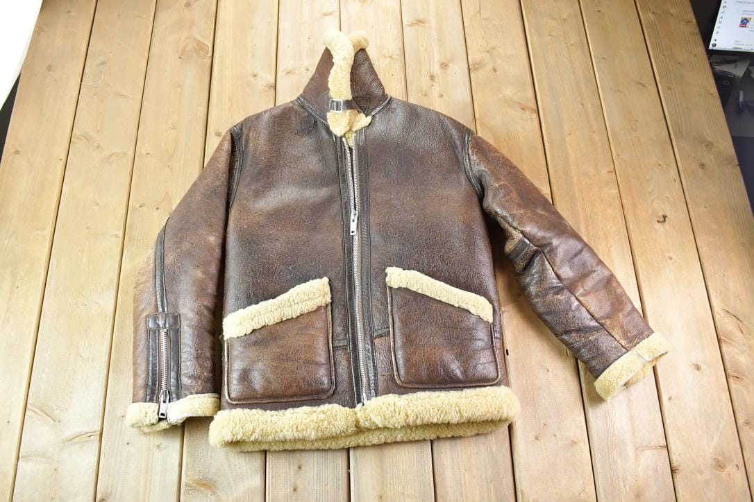 Vintage 1980s Douglas Authentic Shearling Bomber Aviation Jacket Men's Small from propervintagecanada