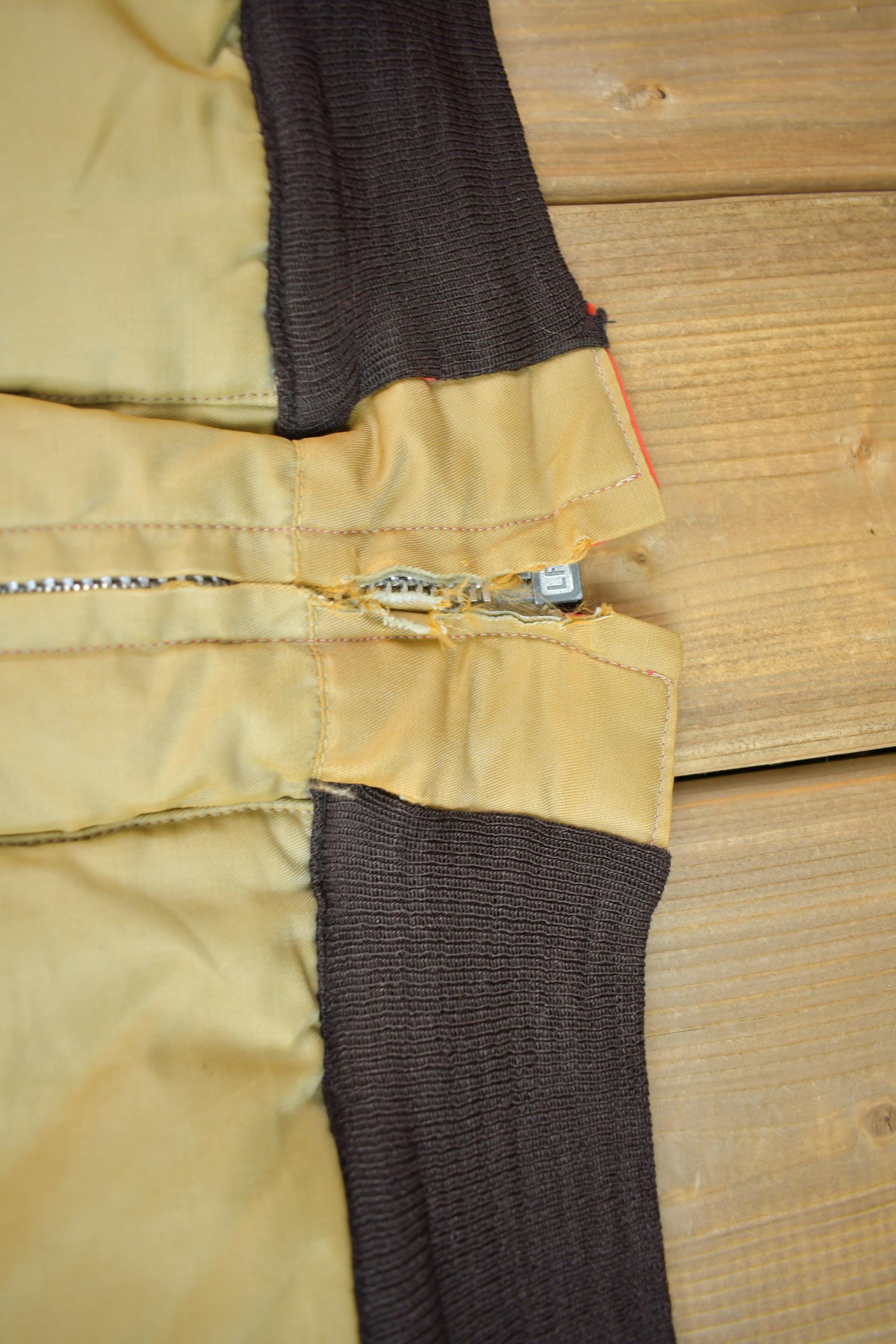 Vintage 1980s Falcon Brand Woods Reversible Goose Down Bomber Jacket Made In Canada Men's Large from propervintagecanada