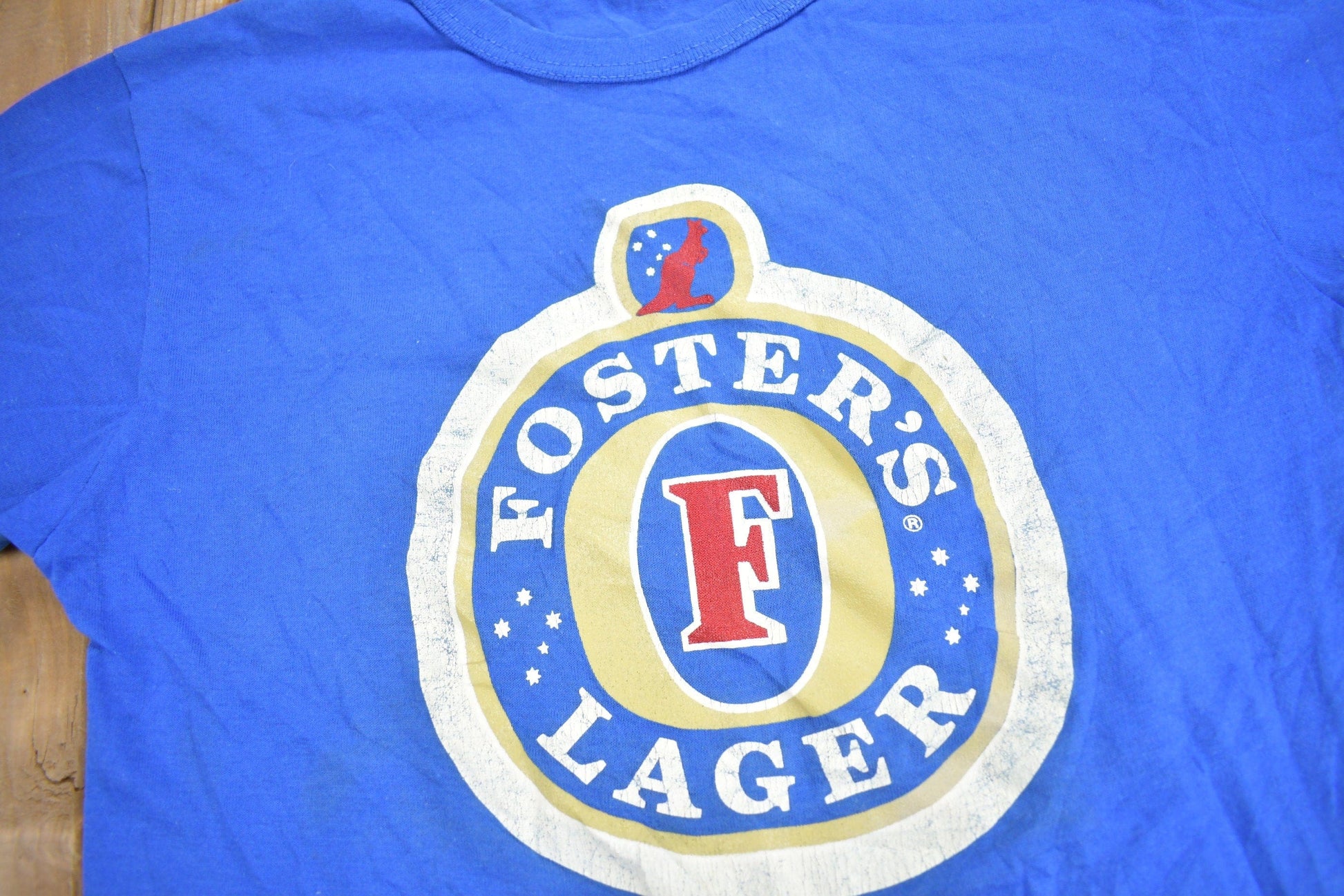 Vintage 1980s Fosters Lager Graphic T Shirt Men's XS from propervintagecanada