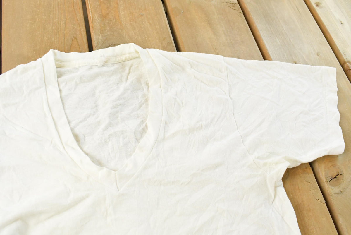 Vintage 1980s Fruit of the Loom Blank V-Neck T-Shirt Men's Small from propervintagecanada