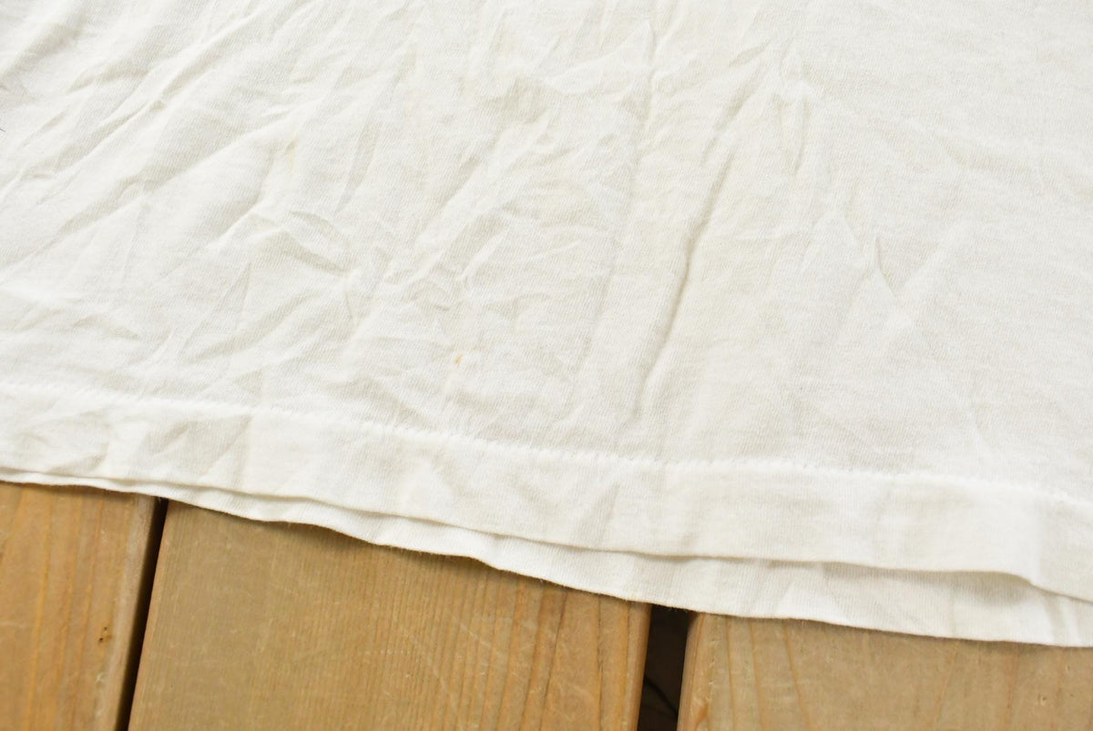 Vintage 1980s Fruit of the Loom Blank V-Neck T-Shirt Men's Small from propervintagecanada