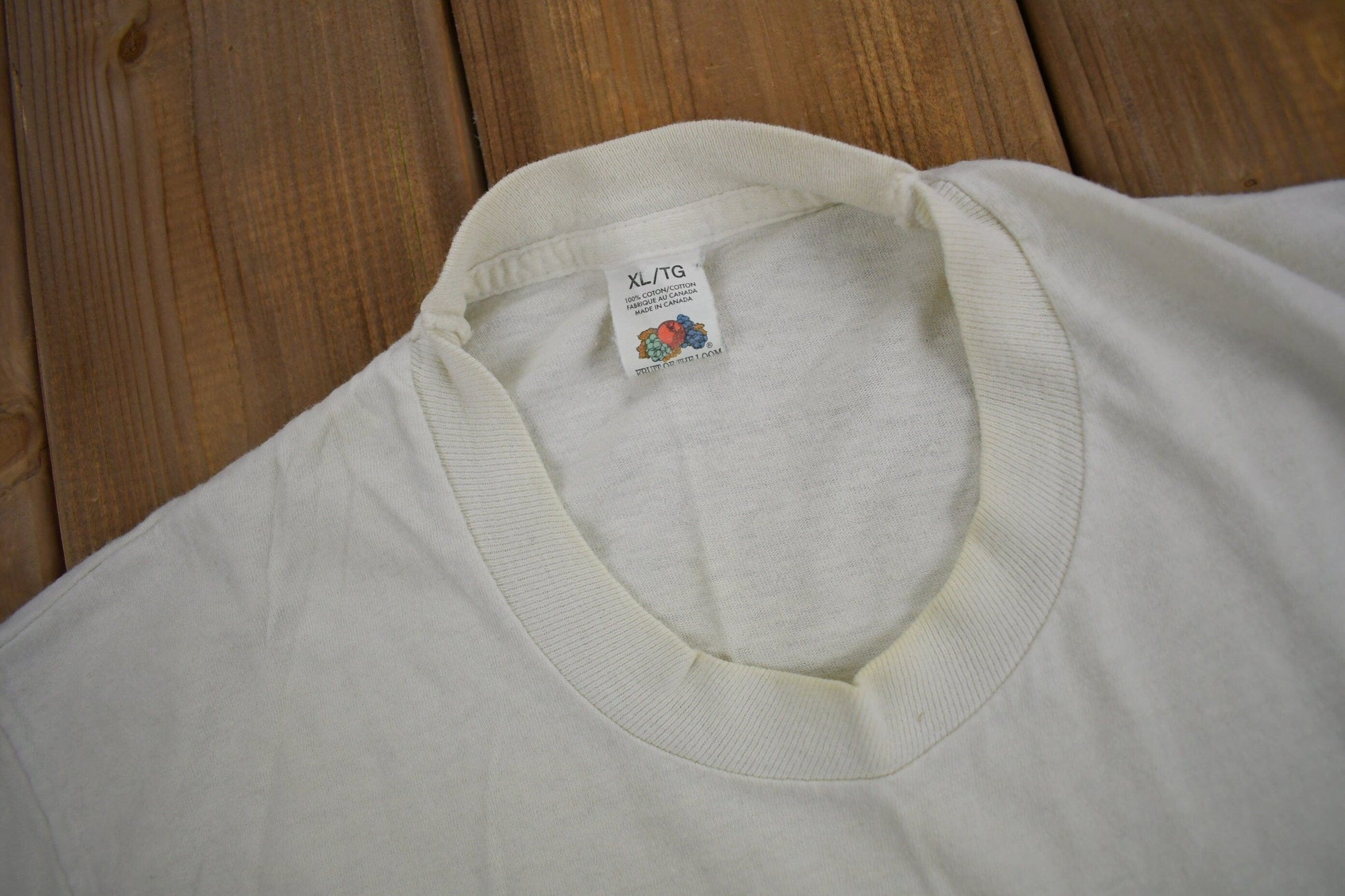 Vintage 1980s Fruit Of The Loom Blank White T Shirt Men's Medium from propervintagecanada