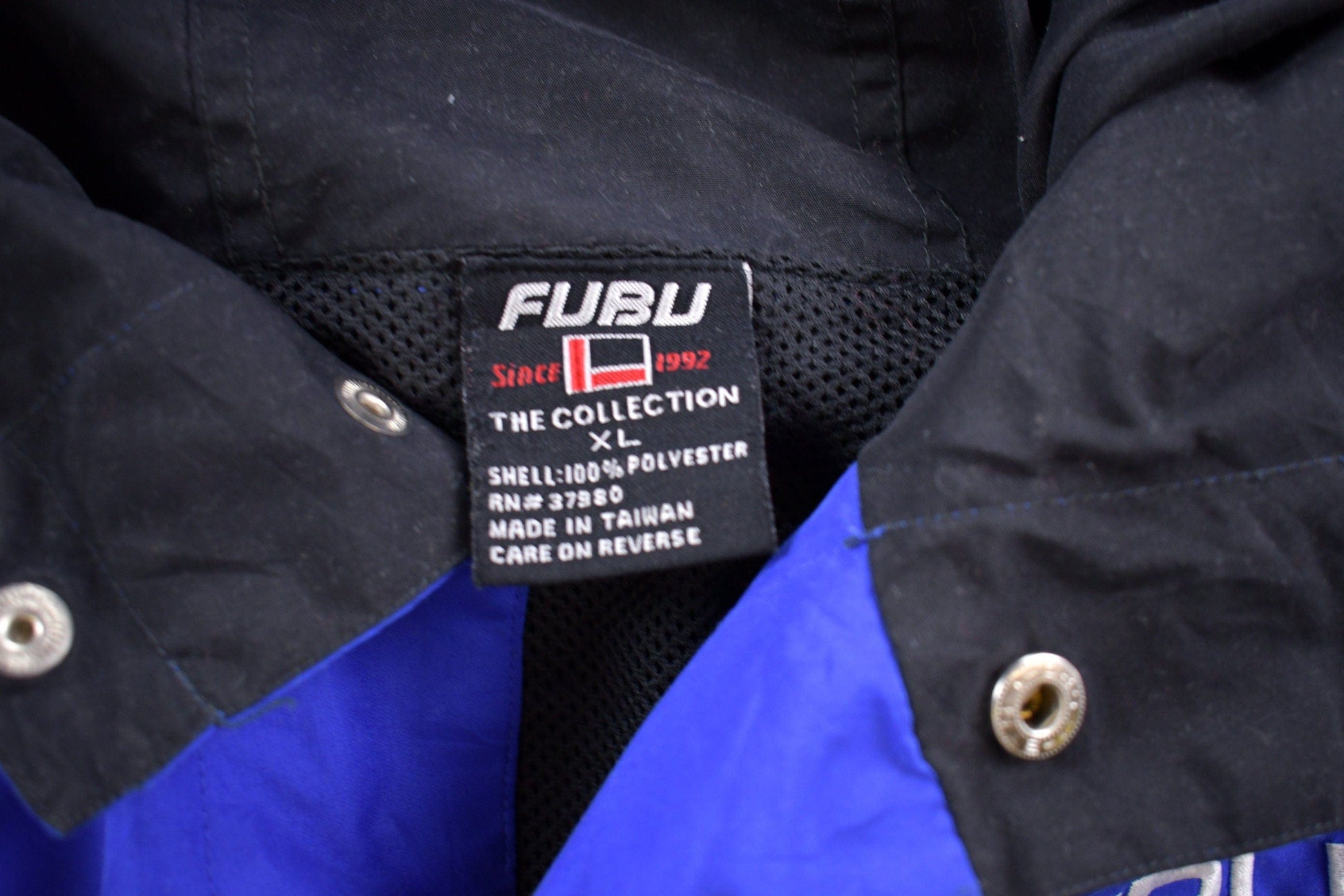 Vintage 1980s Fubu Sport Windbreaker Jacket Men's XL from propervintagecanada
