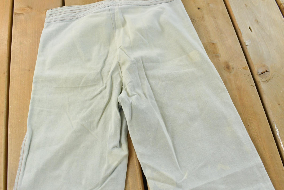 Vintage 1980s Gledson Bell Bottom Denim Light Wash Blue Jeans Men's 27 x 31 from propervintagecanada