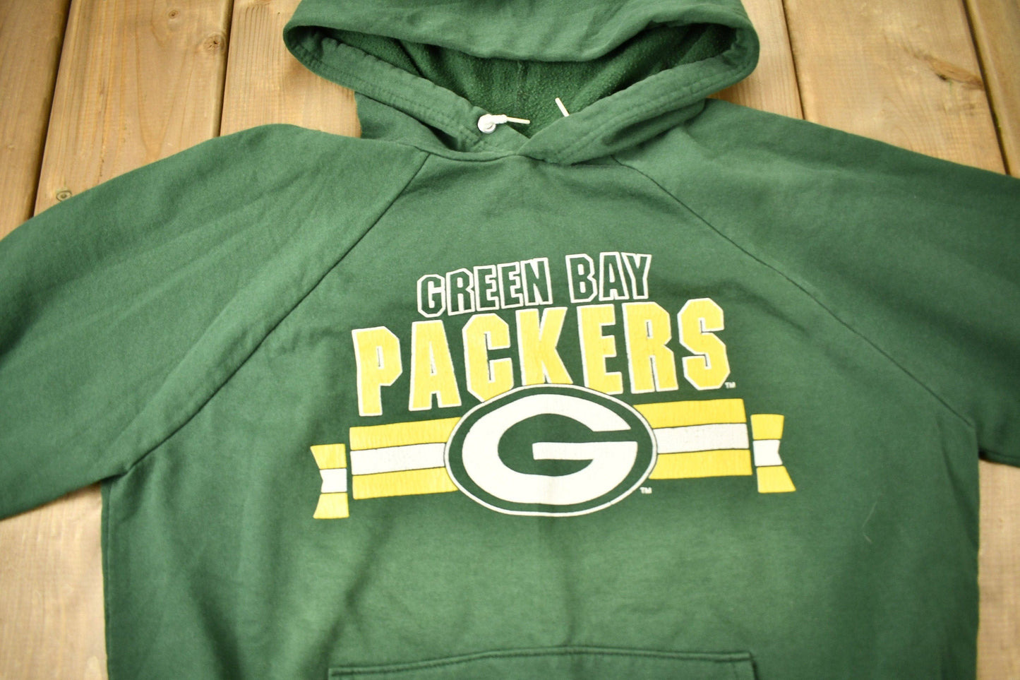 Vintage 1980s Green Bay Packers NFL Raglan Hoodie Men's Large from propervintagecanada