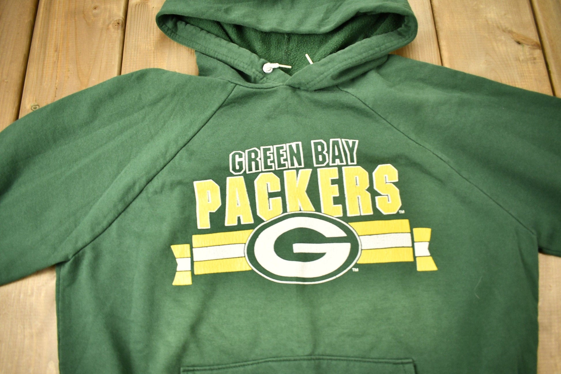 Vintage 1980s Green Bay Packers NFL Raglan Hoodie Men's Large from propervintagecanada