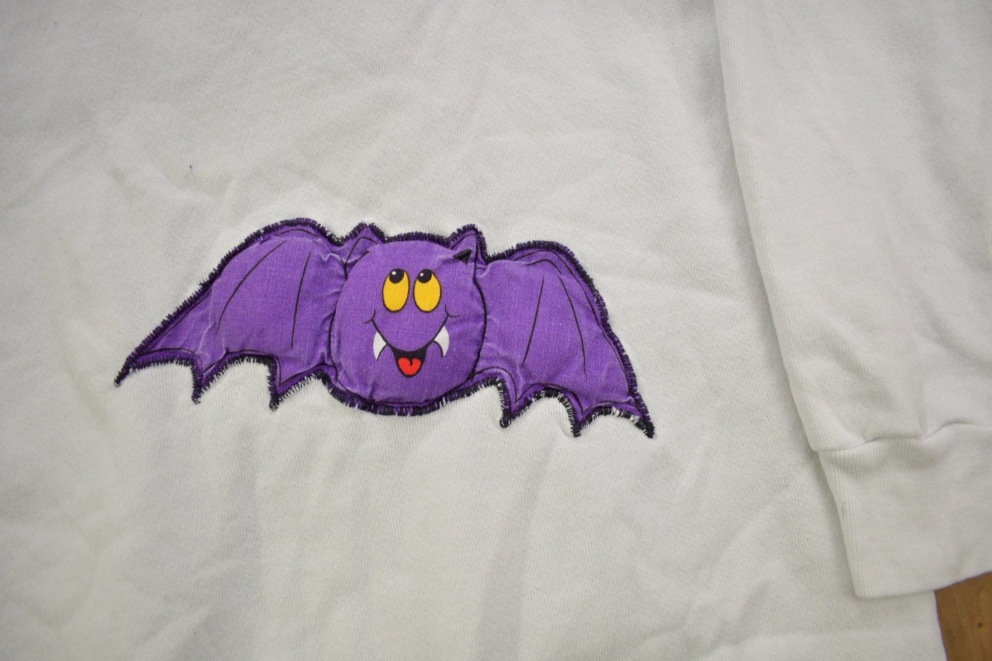 Vintage 1980s Halloween Patchwork Raglan Crewneck Sweatshirt Men's Large from propervintagecanada
