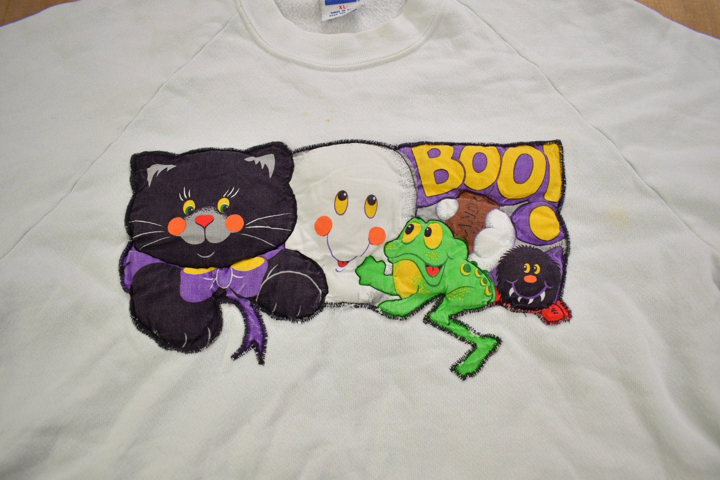 Vintage 1980s Halloween Patchwork Raglan Crewneck Sweatshirt Men's Large from propervintagecanada