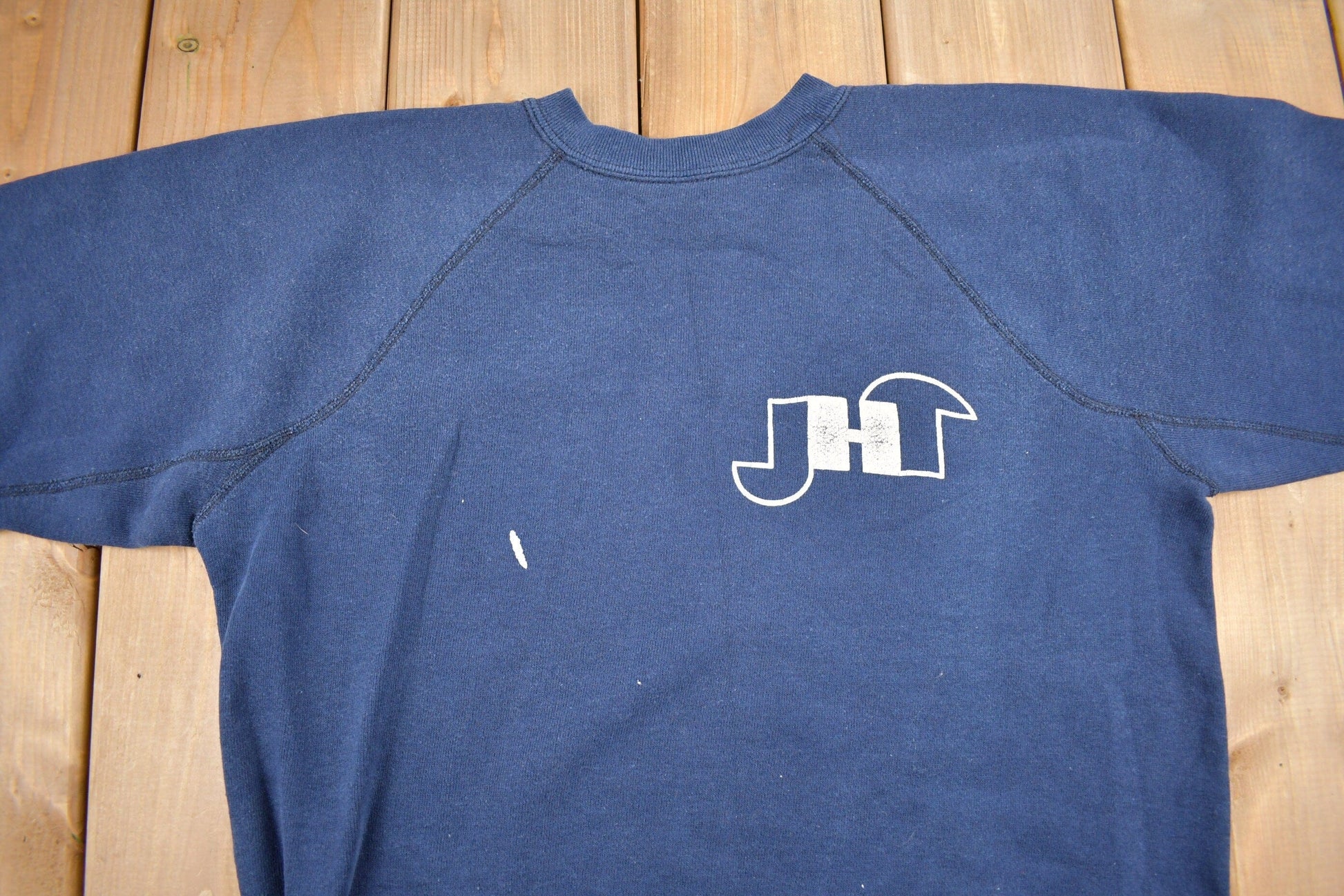 Vintage 1980s J.H. Thompson Academies Graphic Raglan Crewneck Sweatshirt Men's Small from propervintagecanada