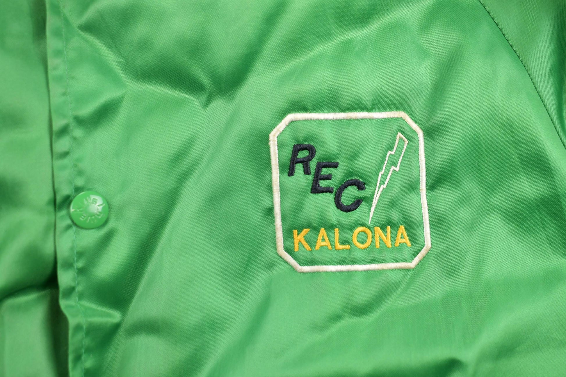 Vintage 1980s Kalona Iowa Satin Bomber Jacket Men's Medium from propervintagecanada
