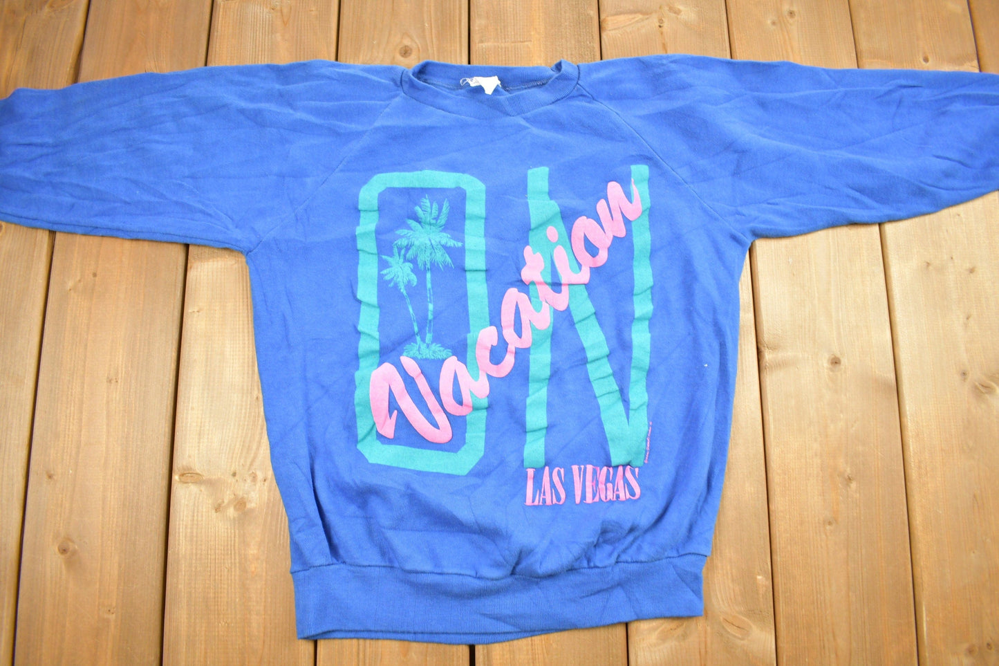 Vintage 1980s Las Vegas On Vacation Raglan Crewneck Sweatshirt Men's Small from propervintagecanada