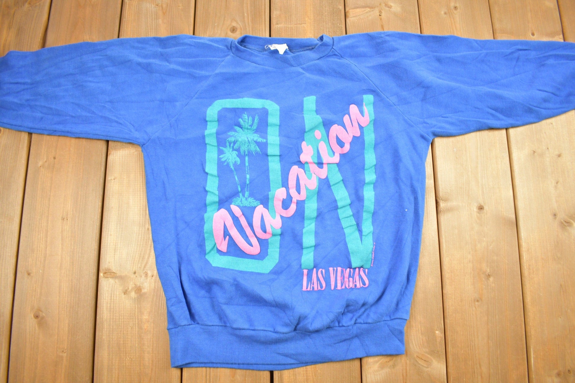 Vintage 1980s Las Vegas On Vacation Raglan Crewneck Sweatshirt Men's Small from propervintagecanada