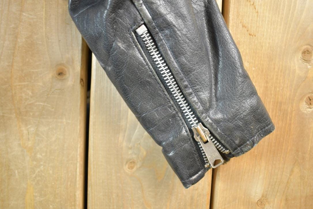 Vintage 1980s Leather Gold Harley Davidson Motorcycle Perfectly Distressed Biker Jacket Made In USA from propervintagecanada