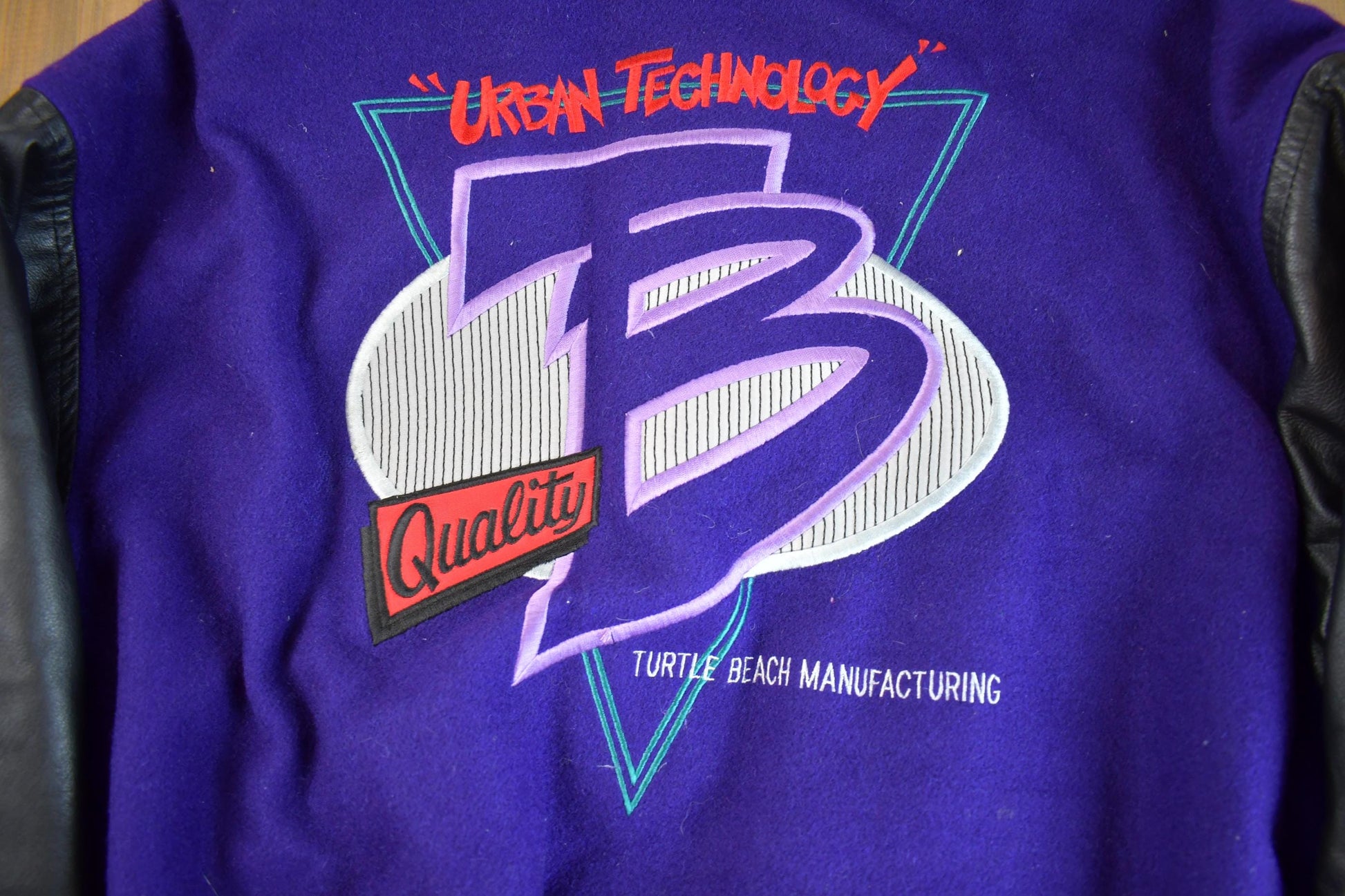 Vintage 1980s Leather & Wool Turtle Beach Urban Technology Embroidered Varsity Jacket Men's XL from propervintagecanada