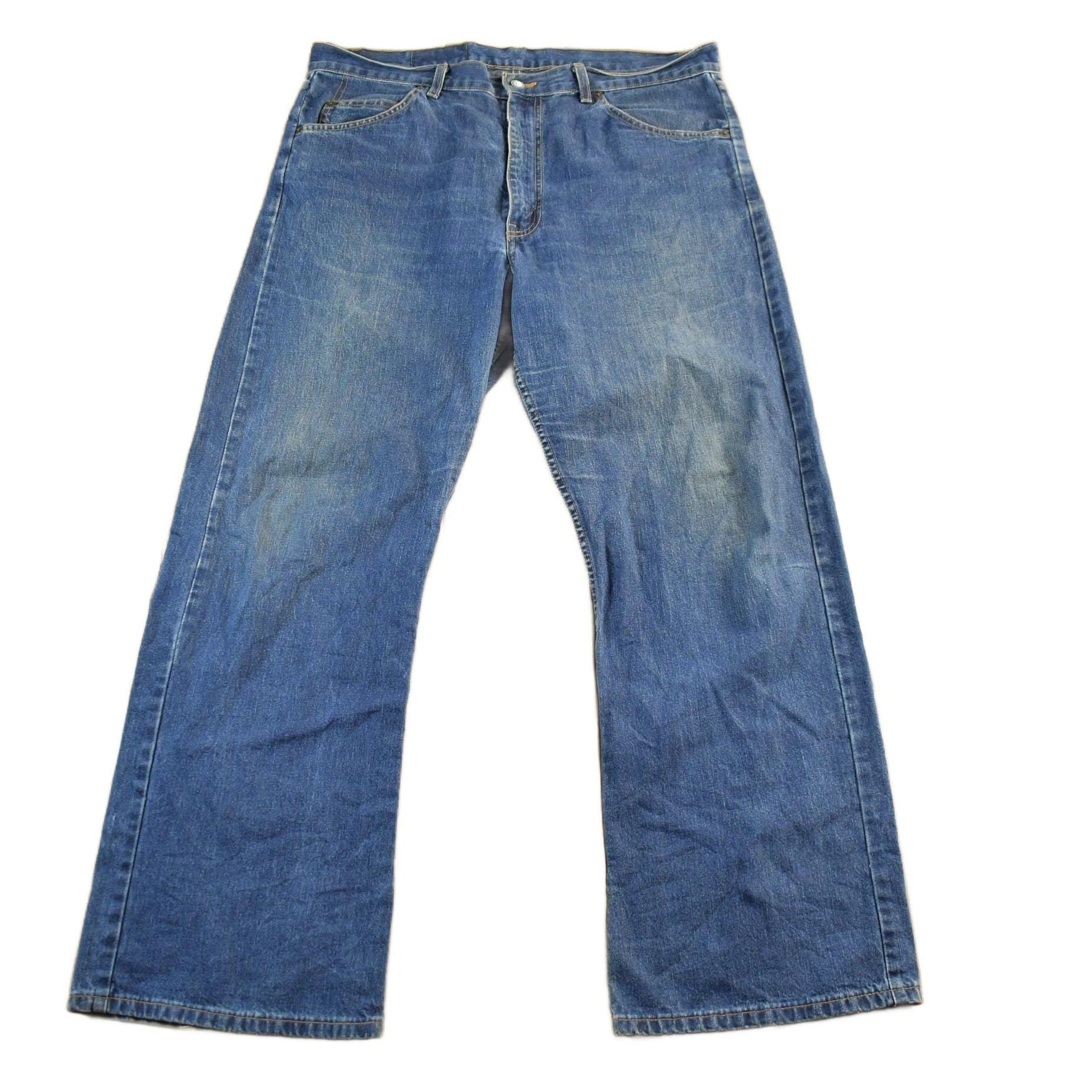 Vintage 1980s Levi's Orange Tab Bell Bottom Flare Denim Jeans Men's Men's 38 x 31 from propervintagecanada