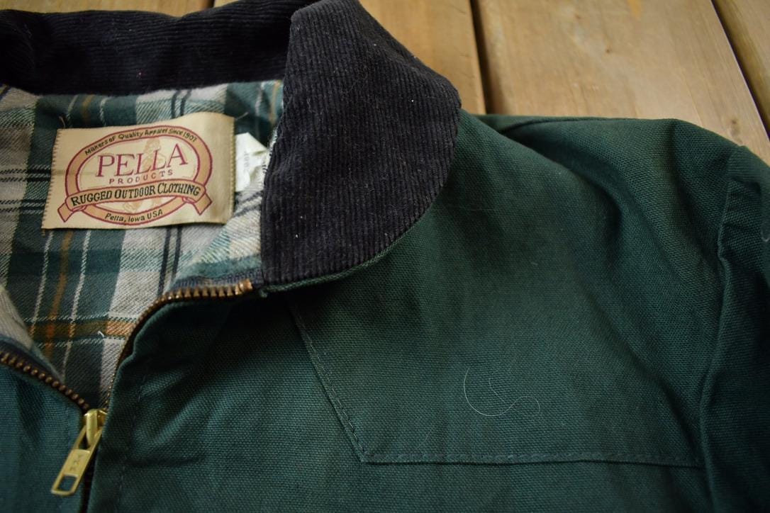 Vintage 1980s Lewis Hybrids Embroidered Rugged Outdoor Clothing Windbreaker Jacket Made In USA from propervintagecanada