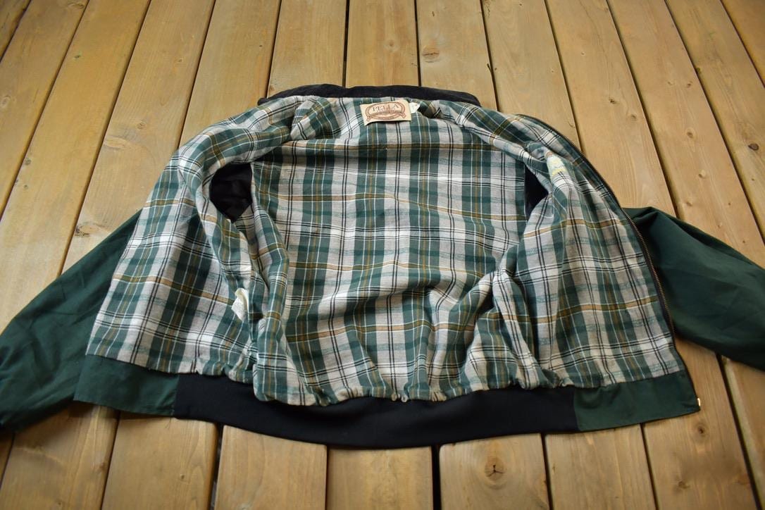 Vintage 1980s Lewis Hybrids Embroidered Rugged Outdoor Clothing Windbreaker Jacket Made In USA from propervintagecanada