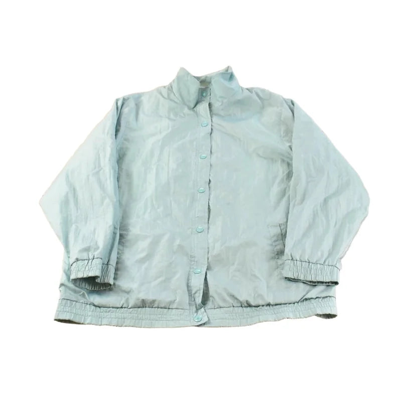 Vintage 1980s Light Blue Nylon Windbreaker Jacket Women's XL from propervintagecanada