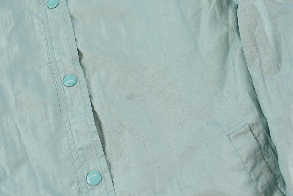 Vintage 1980s Light Blue Nylon Windbreaker Jacket Women's XL from propervintagecanada