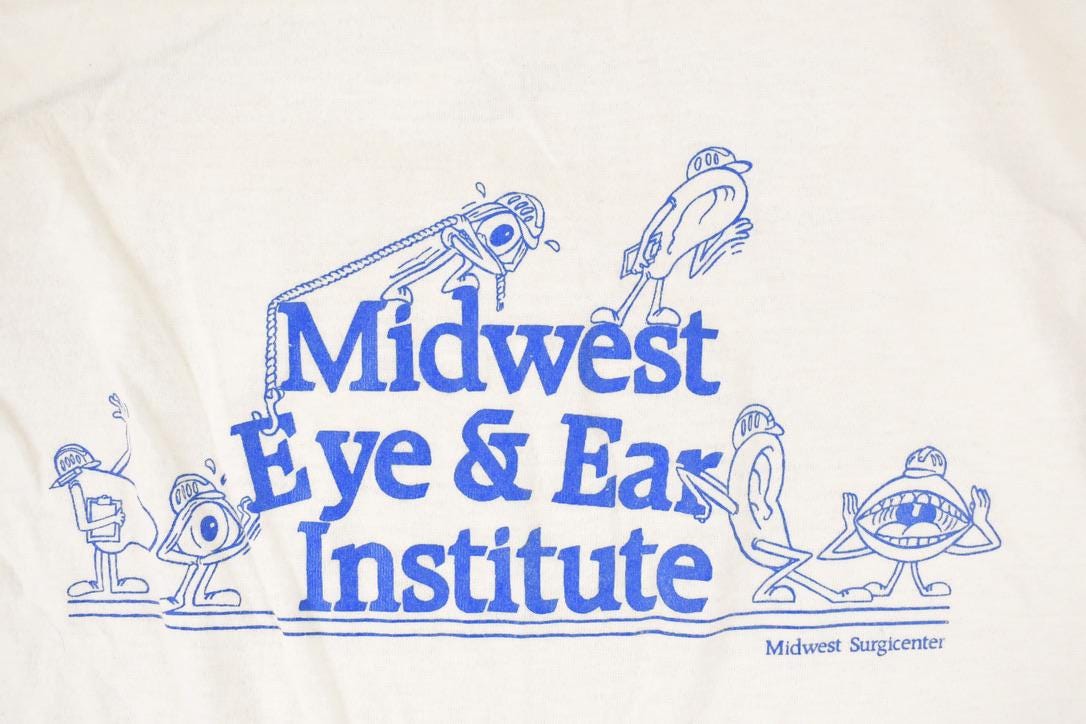 Vintage 1980s Midwest Eye And Ear Souvenir Ringer T-Shirt Men's M from propervintagecanada