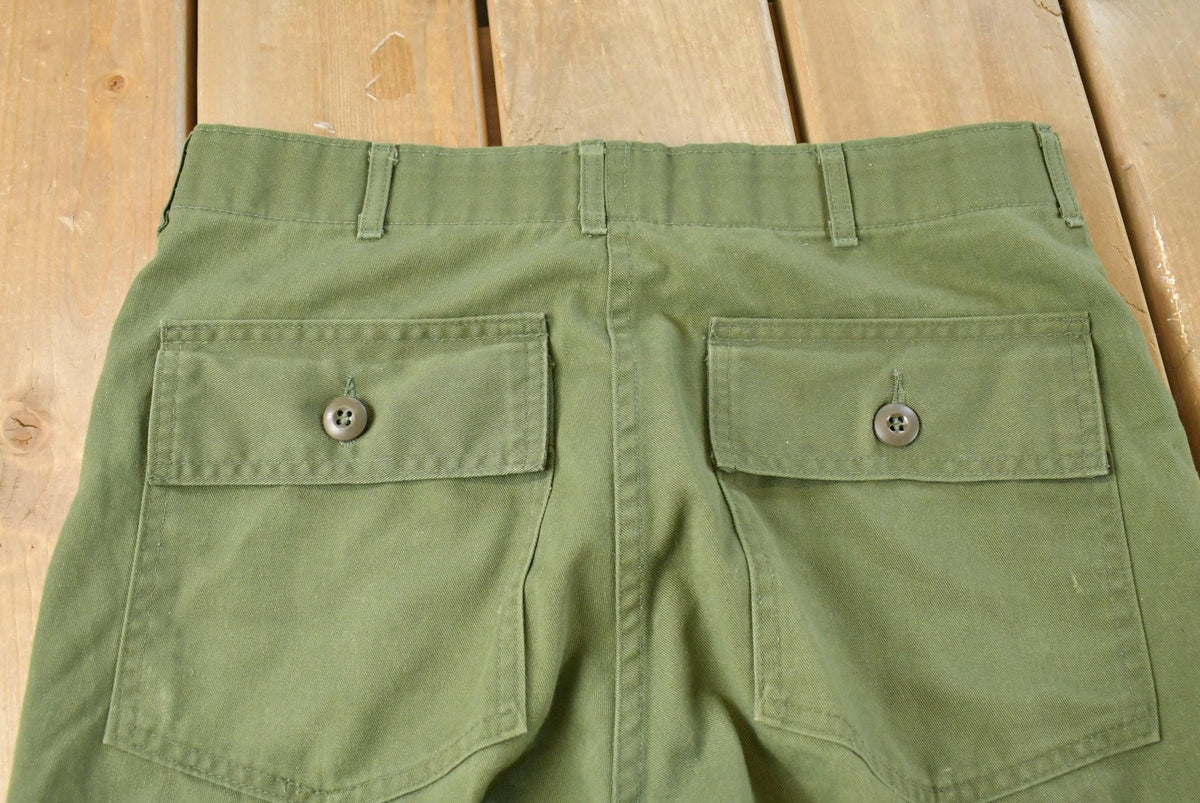 Vintage 1980s Military OG 507 Army Fatigue Pants Men's 32 x 31 from propervintagecanada