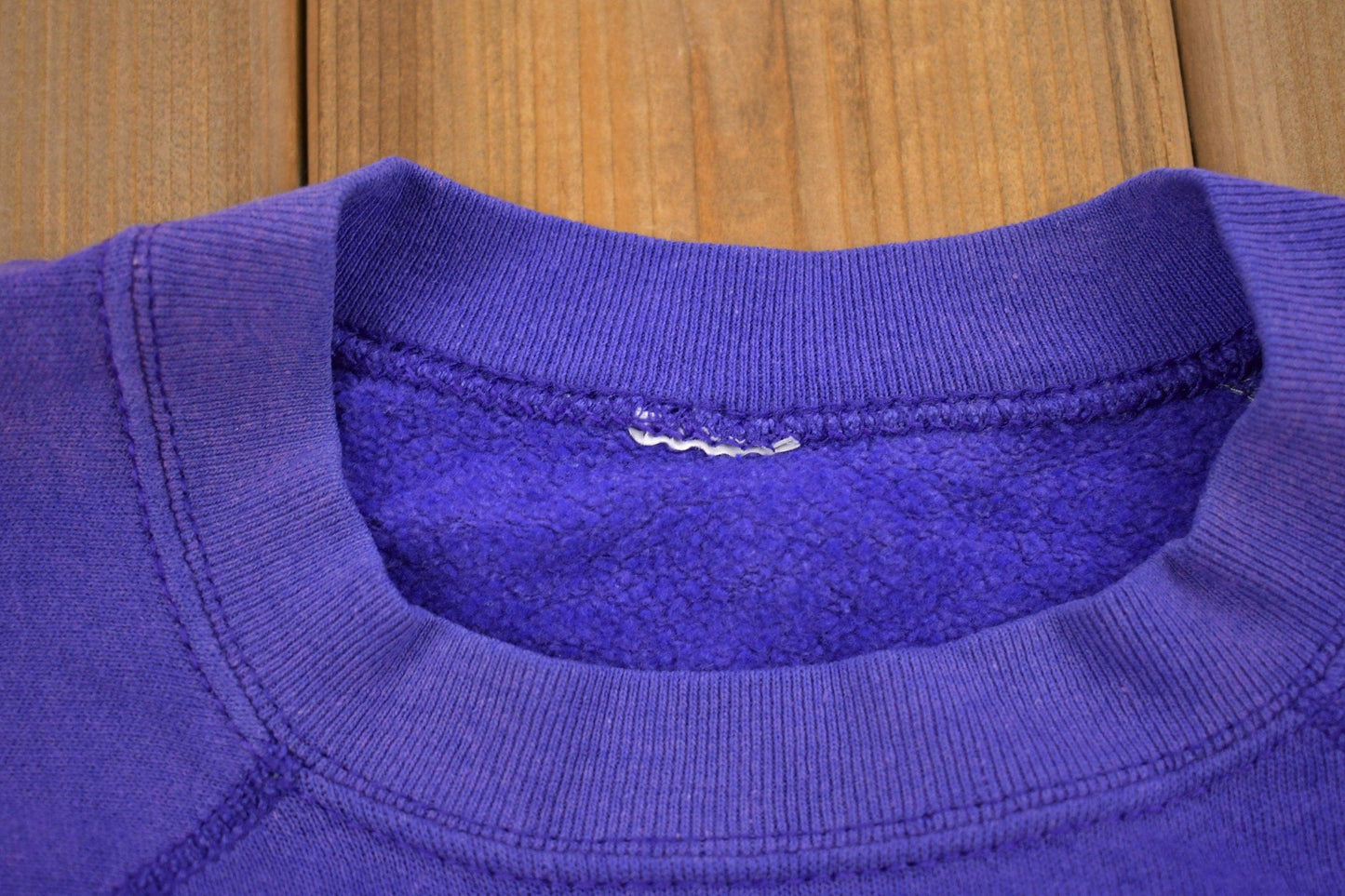 Vintage 1980s Minnesota Viking NFL Graphic Raglan Crewneck Sweatshirt Men's 2XL from propervintagecanada