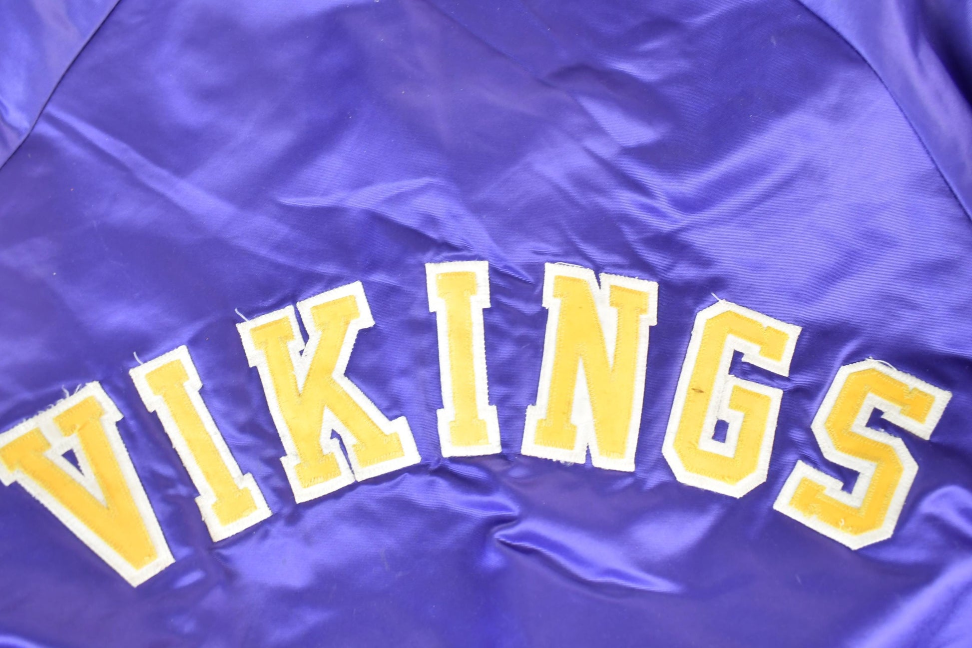 Vintage 1980s Minnesota Vikings Team NFL Football Chalk Line Satin Button Up Bomber Embroidered Puffer Jacket from propervintagecanada