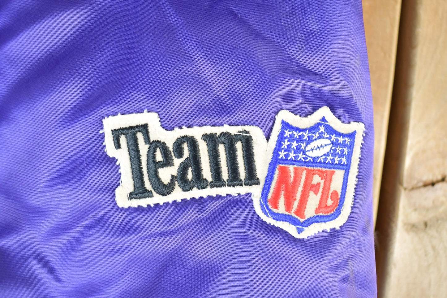 Vintage 1980s Minnesota Vikings Team NFL Football Chalk Line Satin Button Up Bomber Embroidered Puffer Jacket from propervintagecanada