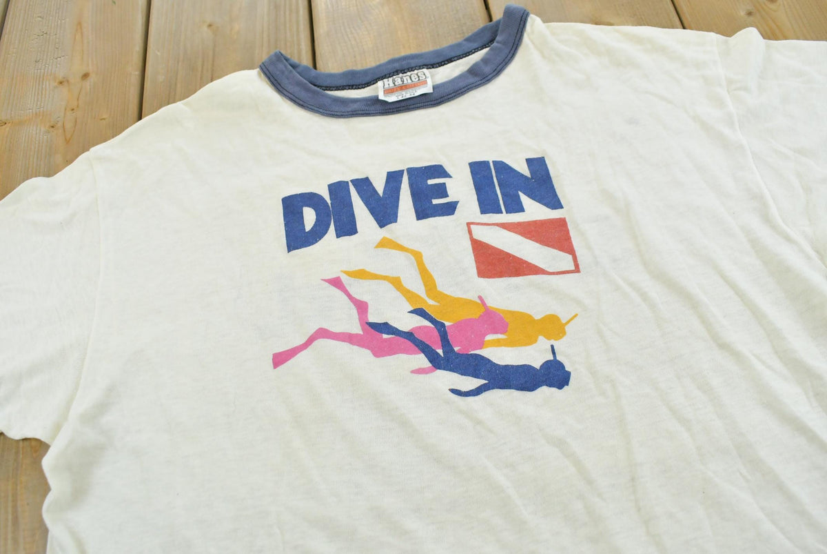 Vintage 1980s Norwegian Cruise Line Scuba Souvenir Ringer T-Shirt Men's L from propervintagecanada