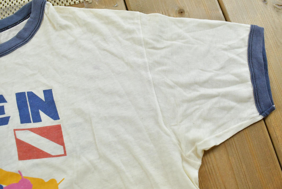 Vintage 1980s Norwegian Cruise Line Scuba Souvenir Ringer T-Shirt Men's L from propervintagecanada