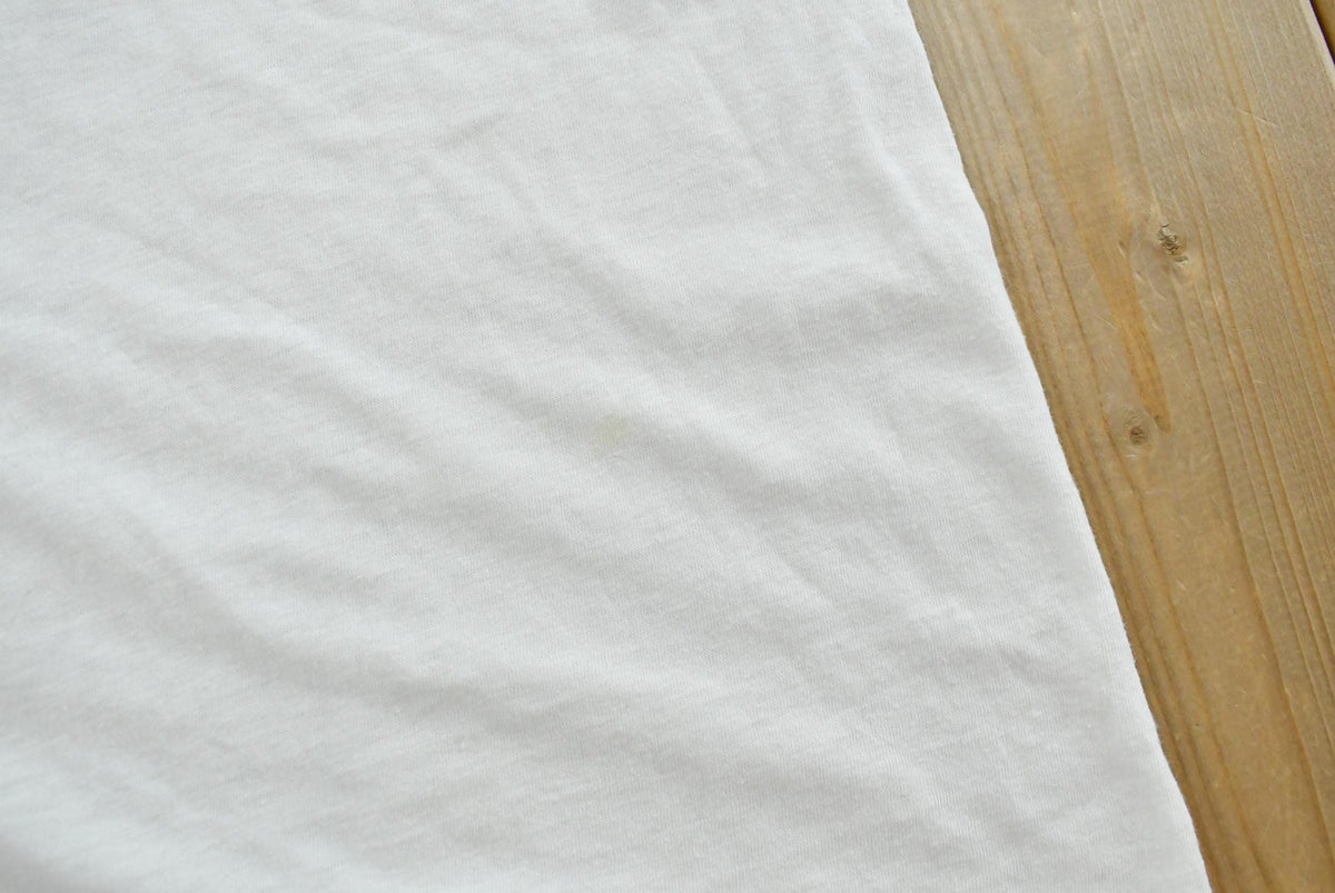 Vintage 1980s Old Doe Rainbow Iron On Print Ringer T-Shirt Men's M from propervintagecanada