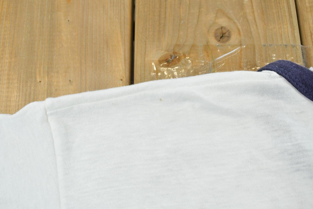 Vintage 1980s Old Doe Rainbow Iron On Print Ringer T-Shirt Men's M from propervintagecanada