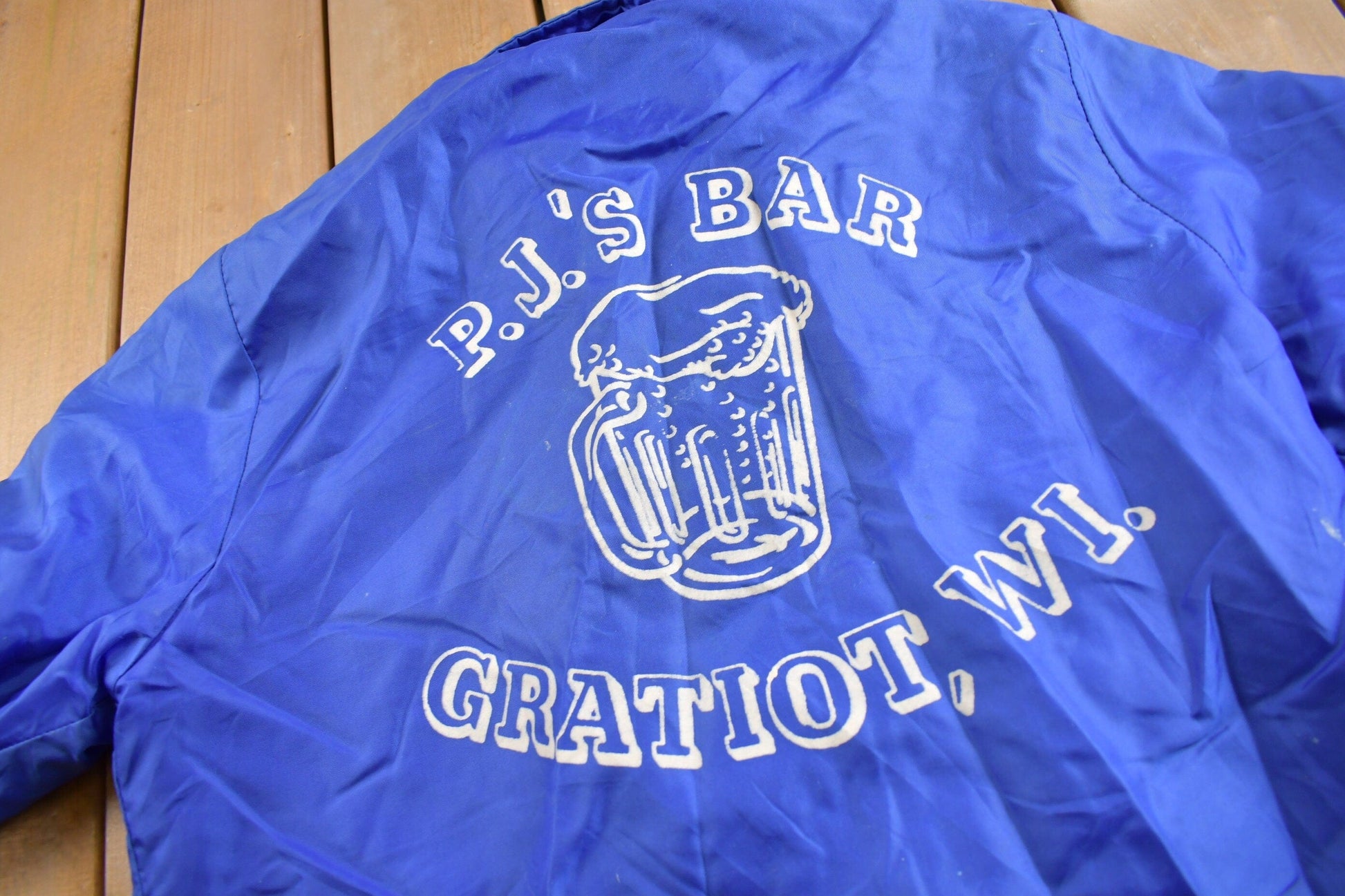Vintage 1980s P.J.'s Bar Gratiot WI Fleece Lined Windbreaker Jacket Men's Medium from propervintagecanada