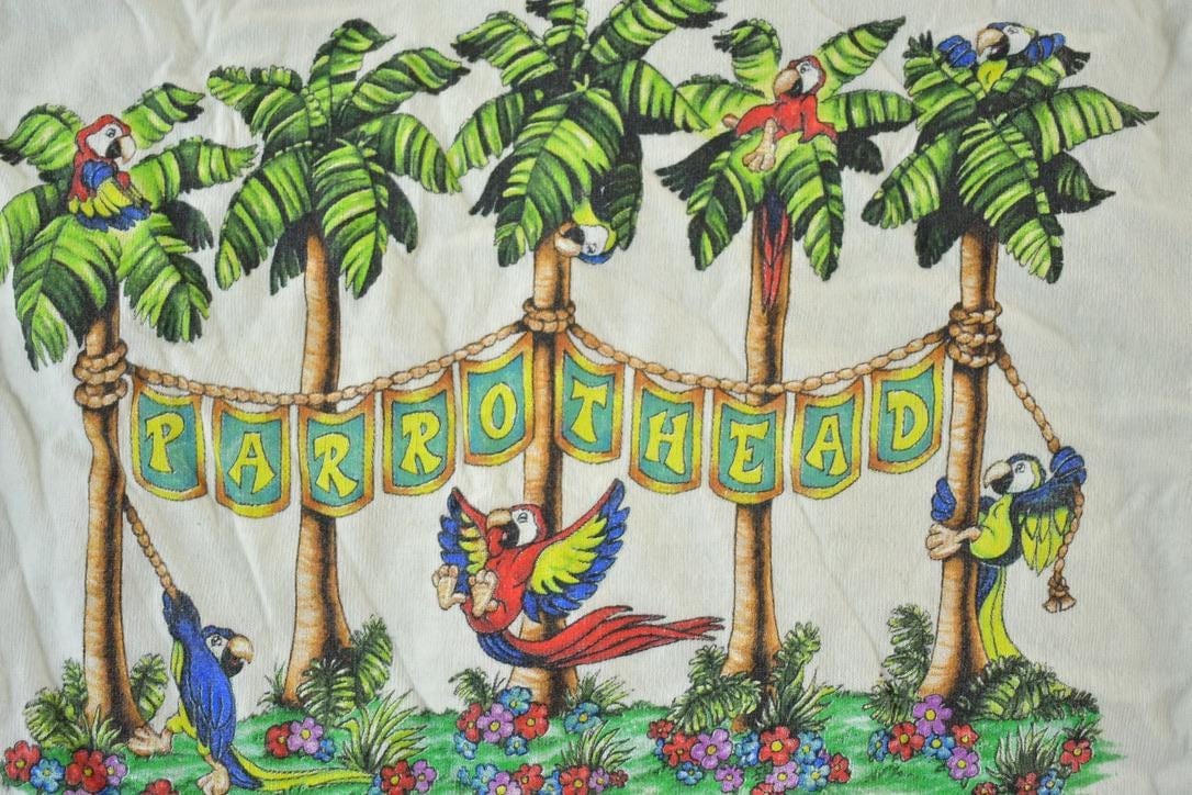 Vintage 1980s Parrothead Jimmy Buffett Souvenir Single Stitch Graphic Print Long Sleeve T-Shirt Men's Small from propervintagecanada