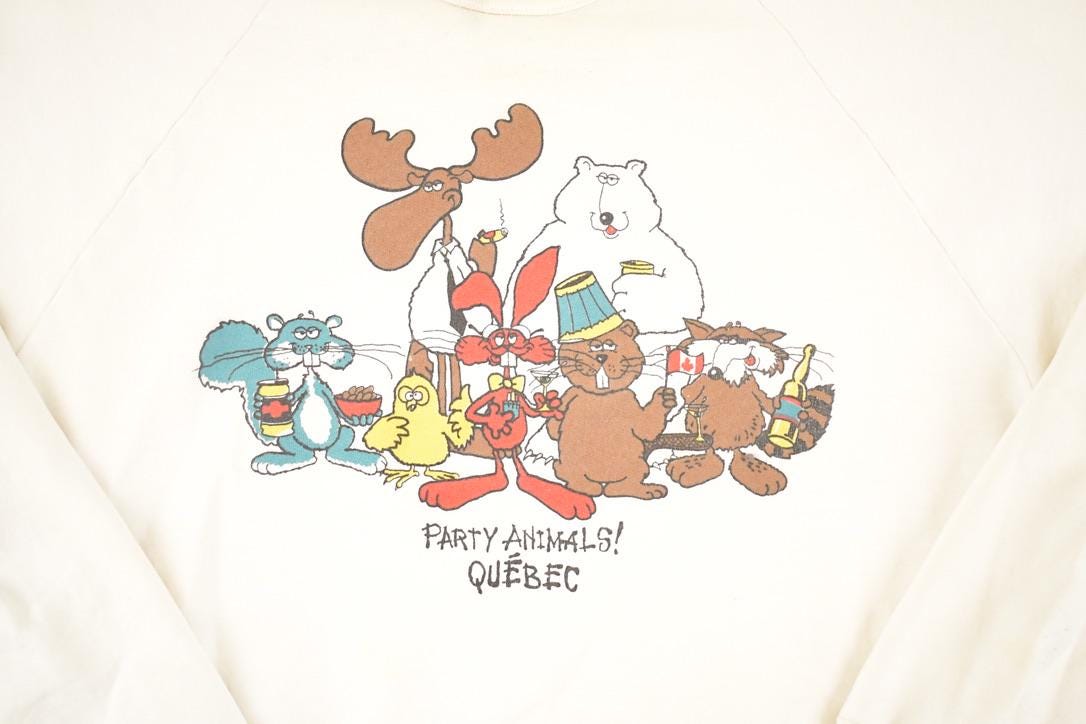 Vintage 1980s Quebec Party Animals Funny Souvenir Crewneck Sweatshirt Men's M from propervintagecanada
