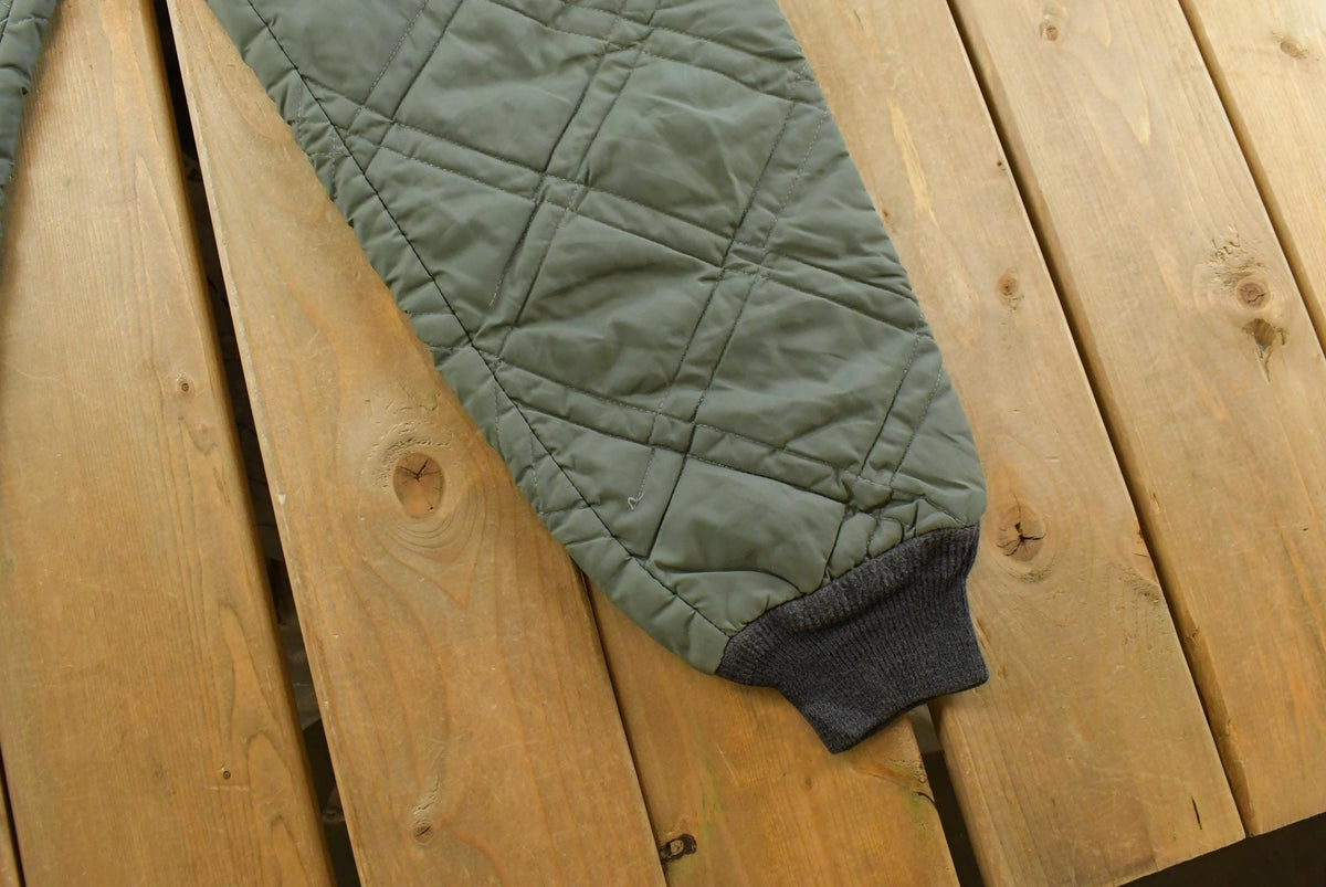 Vintage 1980s Quilted Green Military Liner Puffer Pants Men's XS from propervintagecanada