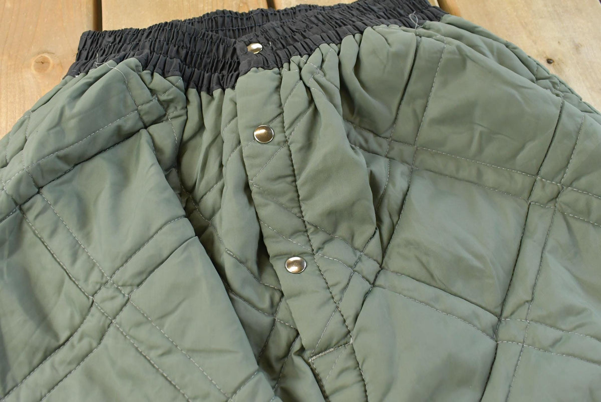 Vintage 1980s Quilted Green Military Liner Puffer Pants Men's XS from propervintagecanada